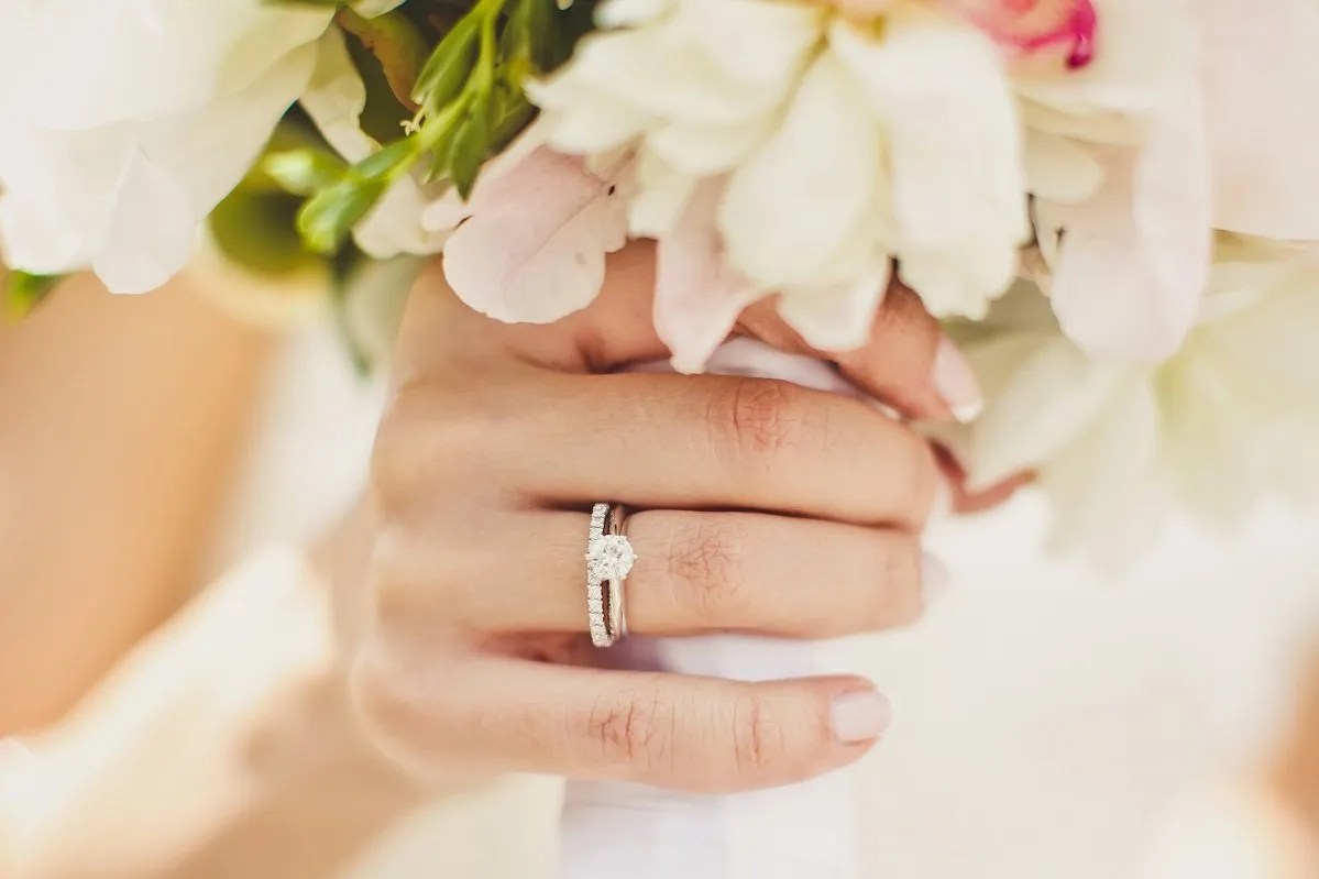 Bride's hands with flowers